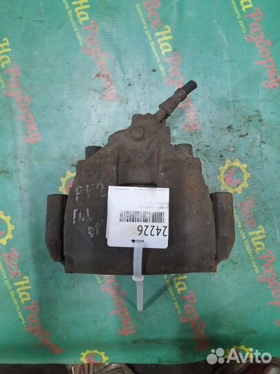 Суппорт передний левый Ford Focus 2 седан 1.8