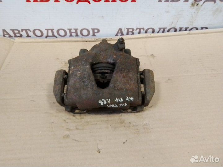 Суппорт тормозной передний левый Opel Vectra A