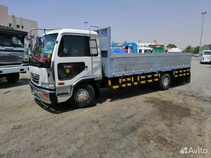 Дефендер левый Nissan Diesel MK210 FE6 1999