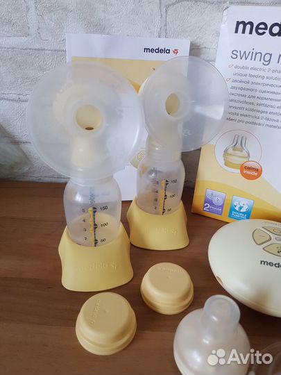 Молокоотсос medela электрический