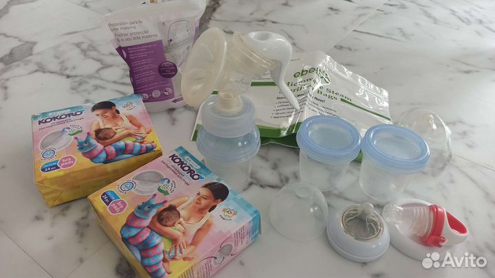 Молокоотсос, пакеты для заморозки, прокладки