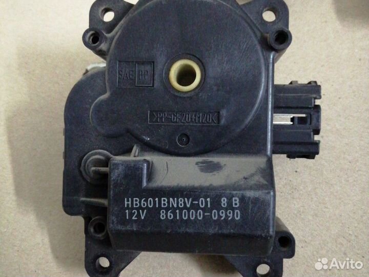 Моторчик регулировки заслонки печки мазда 3 бк