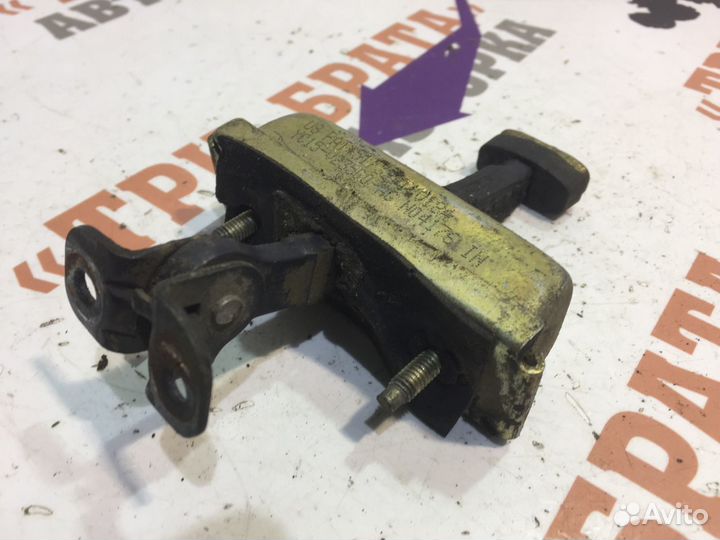 Форд Ограничитель открытия передней двери Лев