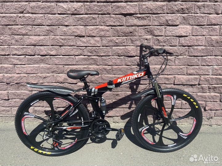 Велосипед с литыми дисками черно-оранжевый новый