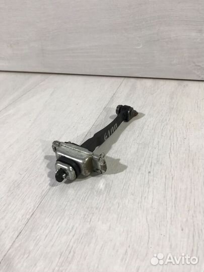 Ограничитель двери chevrolet aveo T300 1.6 мт седа