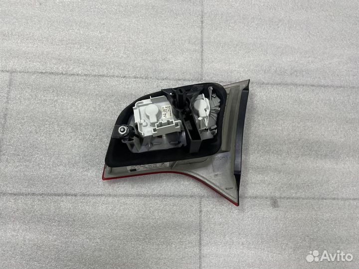 Фонарь левый в багажник Ауди А4 Б7 Авант