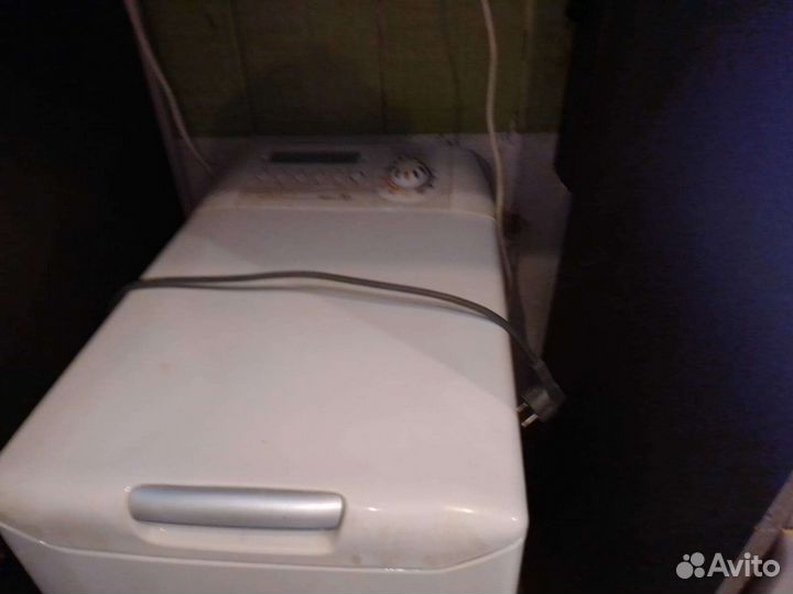 Стиральная машина Candy с вертикальной загрузкой