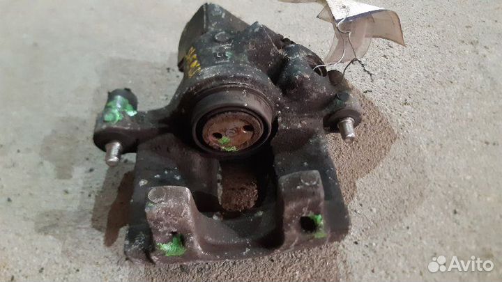 Суппорт тормозной задний левый задний левый Ford