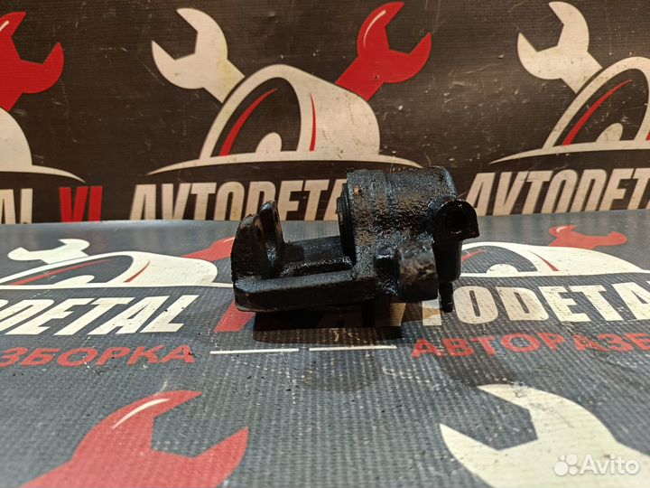 Суппорт задний Mitsubishi Lancer 9