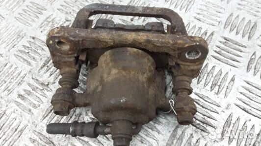 Суппорт тормозной задний левый nissan qashqai J10