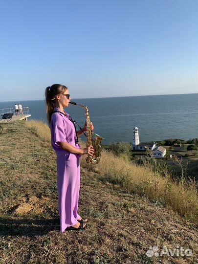 Саксофонист на мероприятие