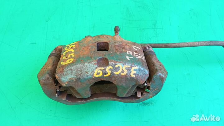 Суппорт передний левый для Mitsubishi Lancer 9