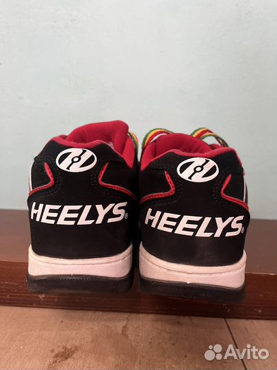 Кроссовки на роликах heelys