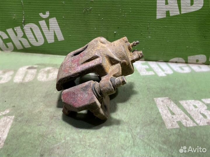 Суппорт тормозной передний правый Mazda 626 GE