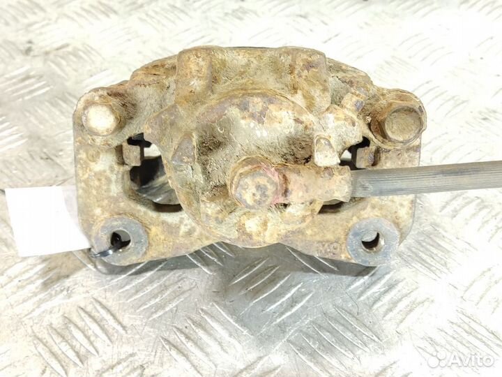 Суппорт передний правый Mitsubishi Lancer 9