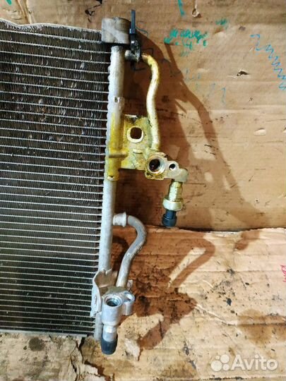 Радиатор кондиционера Opel Astra