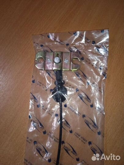 Трос ручника передний Киа Спектра