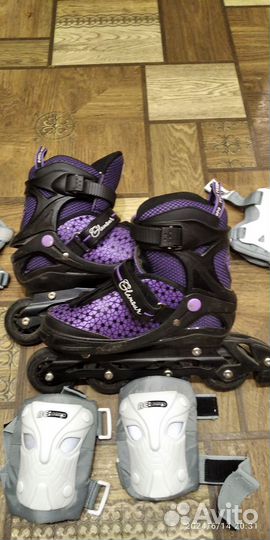 Роликовые коньки