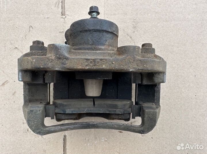 Суппорт передний левый Daewoo Nexia