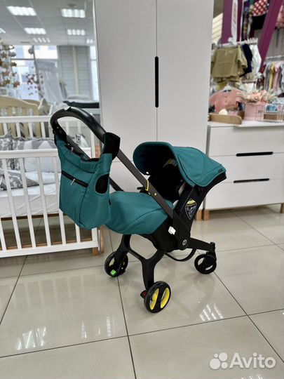 Автолюлька на колесах