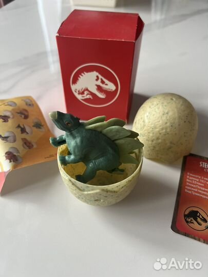 Игрушка динозавр jurassic world макдональдс