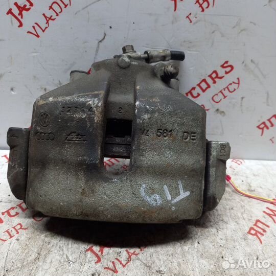 Суппорт тормозной передний левый Volkswagen Touran