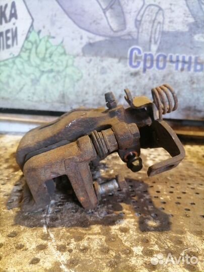 Суппорт тормозной задний правый Kia Rio