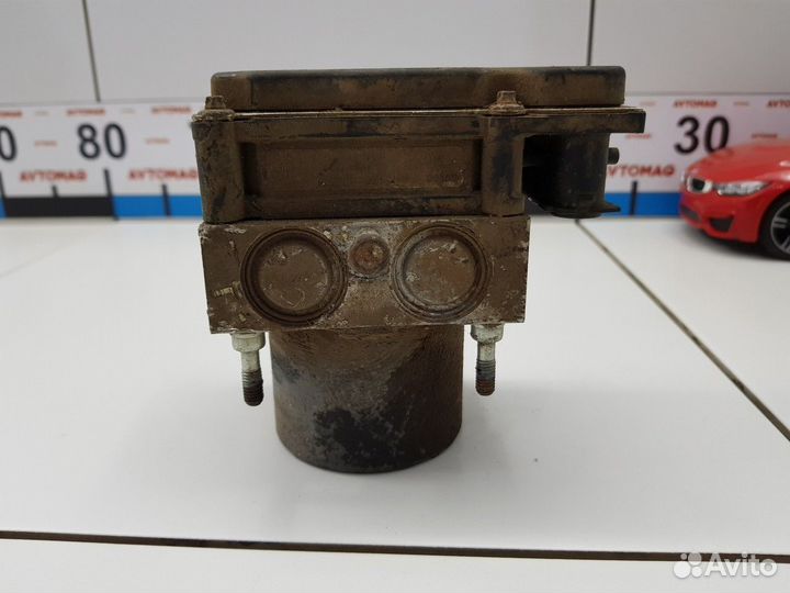 Блок ABS (насос) (Nissan Primera)