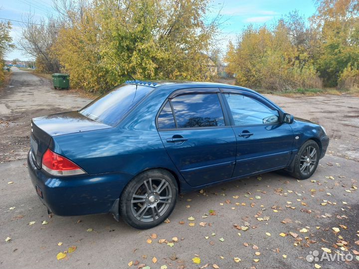Mitsubishi Lancer 1.6 AT, 2005, 300 000 км