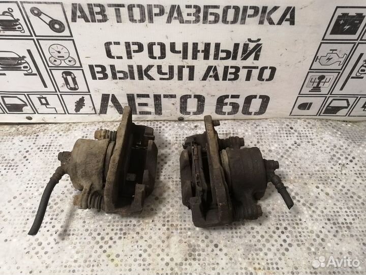 Суппорт тормозной передний для Nissan Almera N15