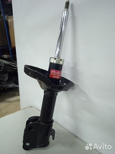 Амортизатор передний лев Subaru Legacy 2003-2009