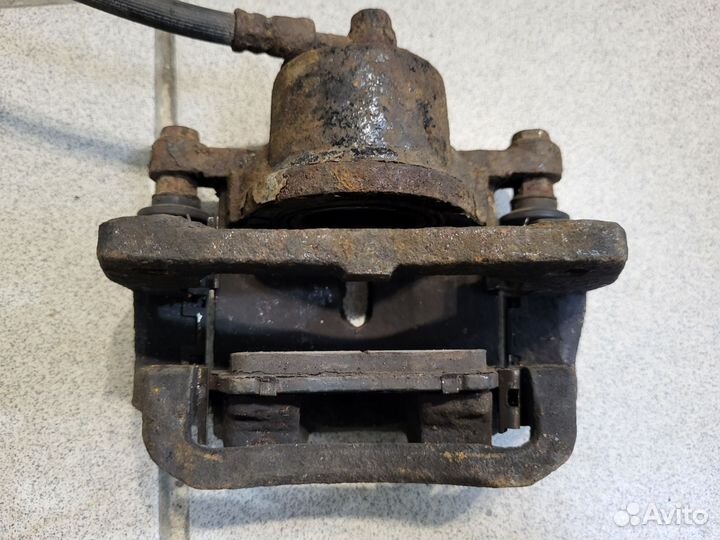 Суппорт передний левый Geely mk