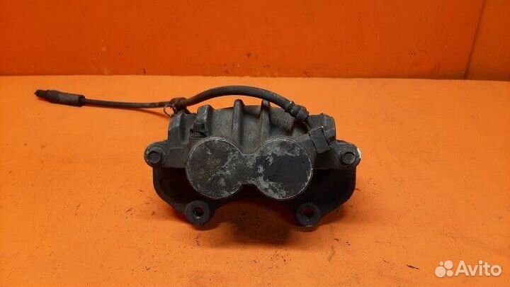 Суппорт тормозной передний левый Cadillac Cts 2009