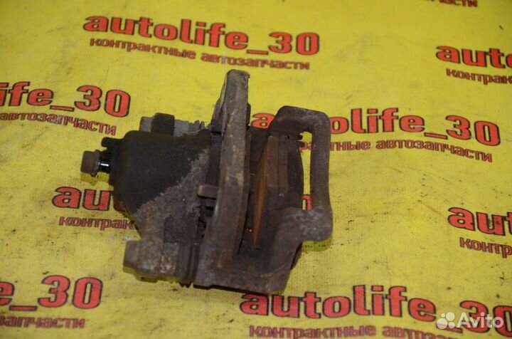 Суппорт тормозной задний левый Kia Soul