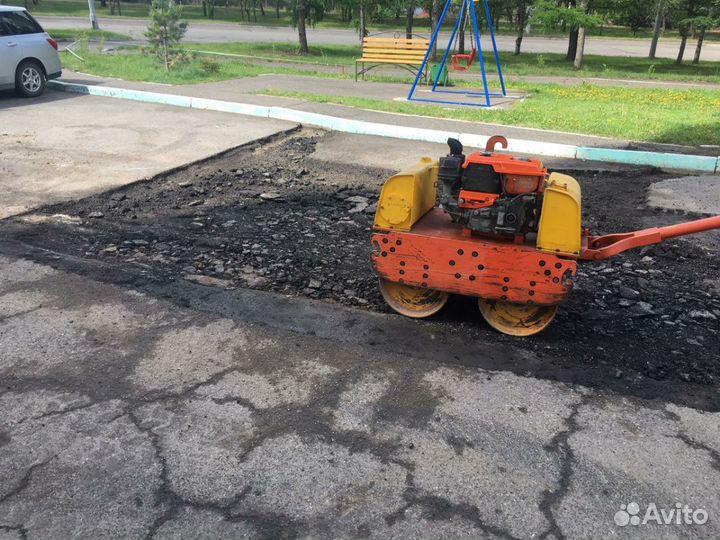 Дорожный ручной каток с вибрацией