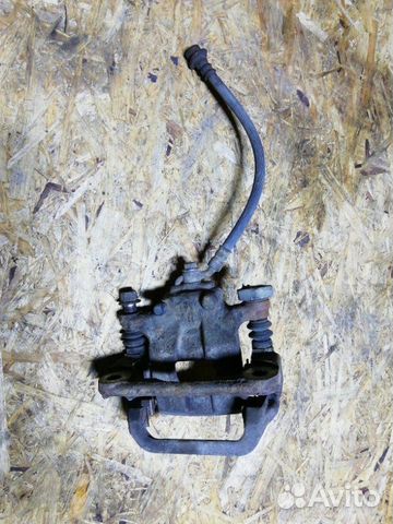 Суппорт тормозной задний правый Nissan Teana L33