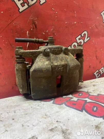 Суппорт тормозной передний правый Nissan X-Trail