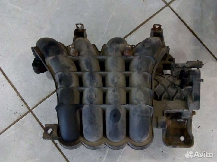 Выпускной коллектор Митсубиси Ланцер 10