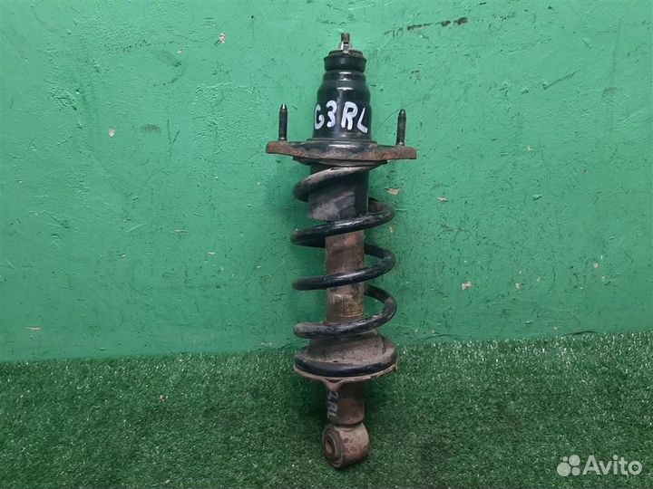 Стойка амортизатора задняя левая Honda CR-V 3 (RE