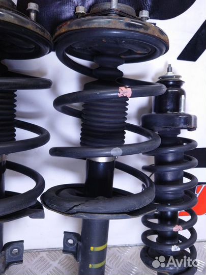 Стойки амортизатора Mitsubishi Outlander XL