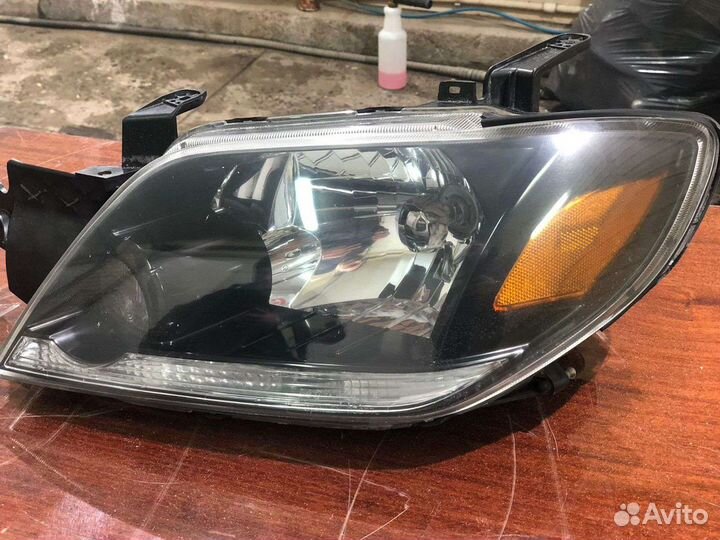 Фара Mitsubishi Outlander