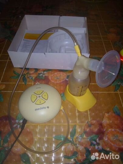Молокоотсос электронный medela swing