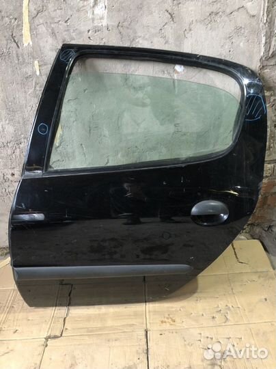 Дверь Peugeot 206