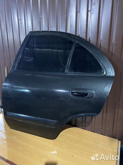 Задняя левая дверь на ниссан альмера н16