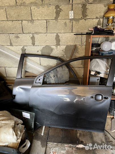 Двери левые Toyota Corolla e150