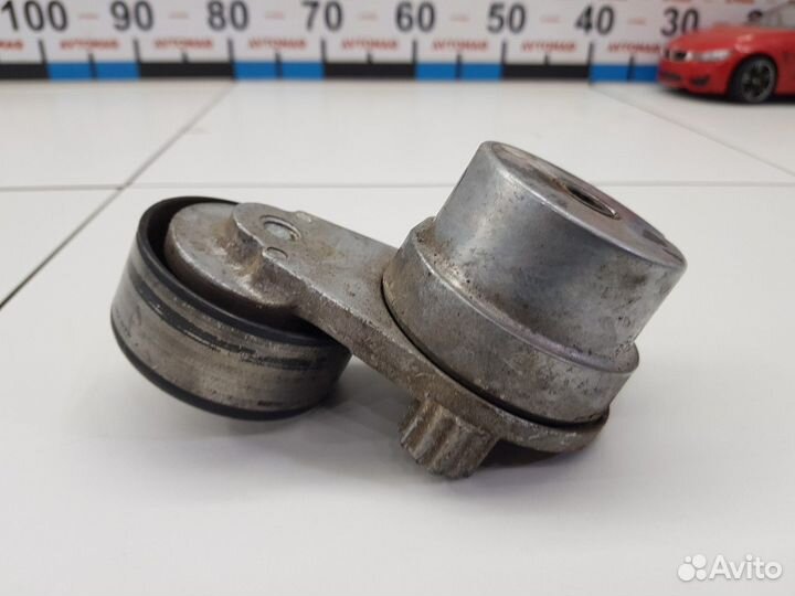 Натяжитель ремня (Opel Astra)