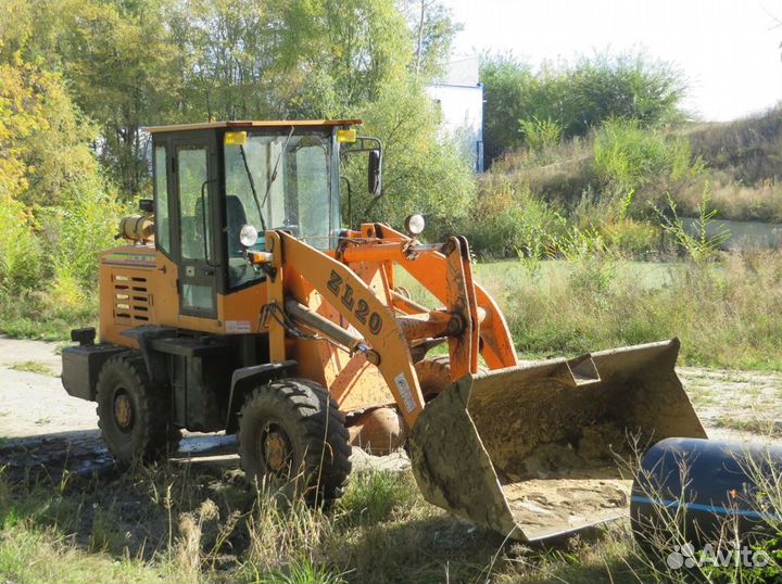 Машинист фронтального погрузчика ZL20