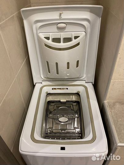 Стиральная машинка с вертикальной загрузкой