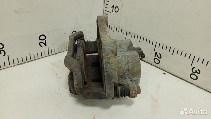 Суппорт передний левый Nissan Qashqai+2