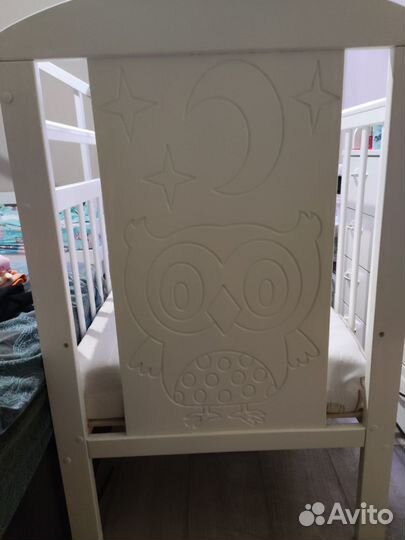 Детская кроватка с поперечным маятником